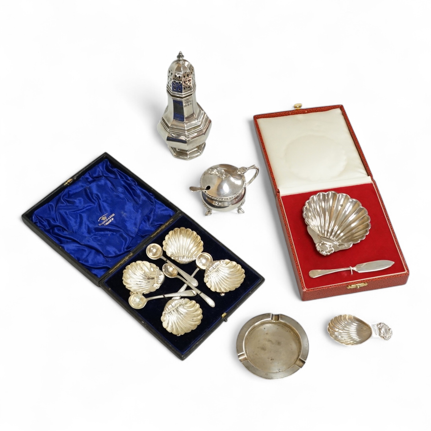 A group of small silver to include a cased modern silver butter shell and knife by Francis Howard Ltd, Sheffield, 1988, a cased set of four late Victorian silver shell salts with four associated plated spoons, a late 196